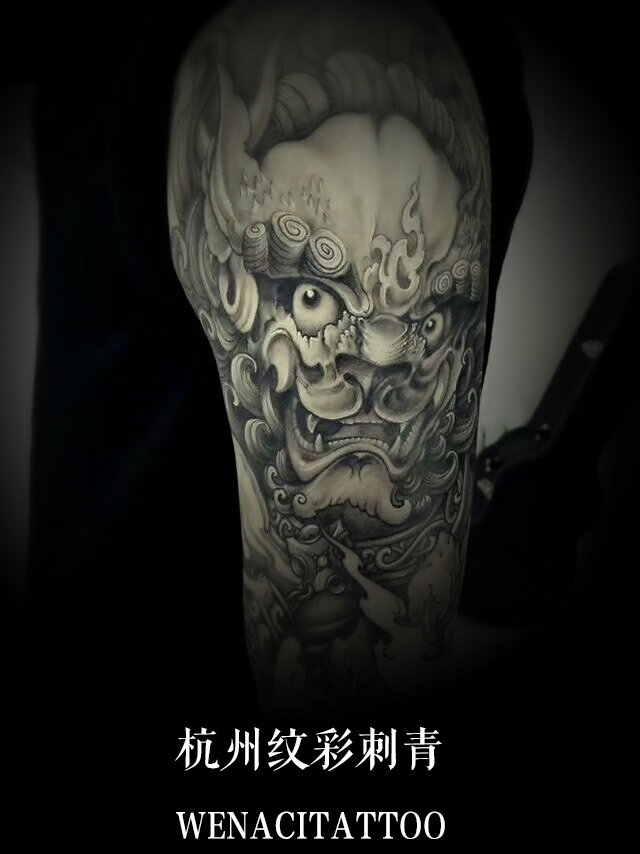 杭州的韩先生大臂唐狮纹身